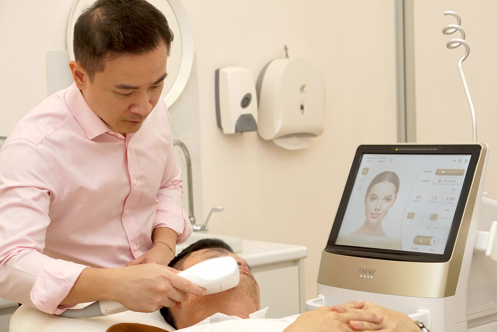 Dr Bob is performing HIFU treatment for skin tightening.